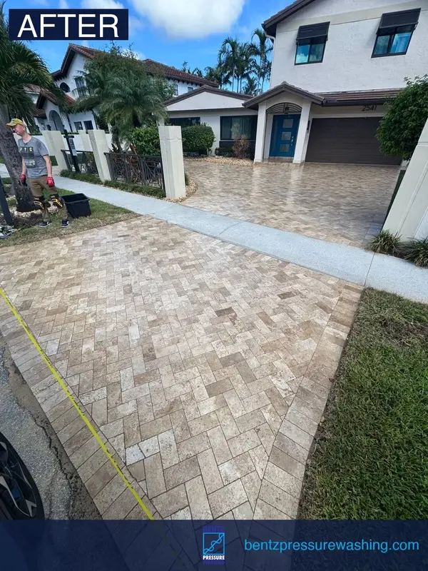 Driveway cleaning after Fort Lauderdale pressure washing before and after — bright restored concrete
