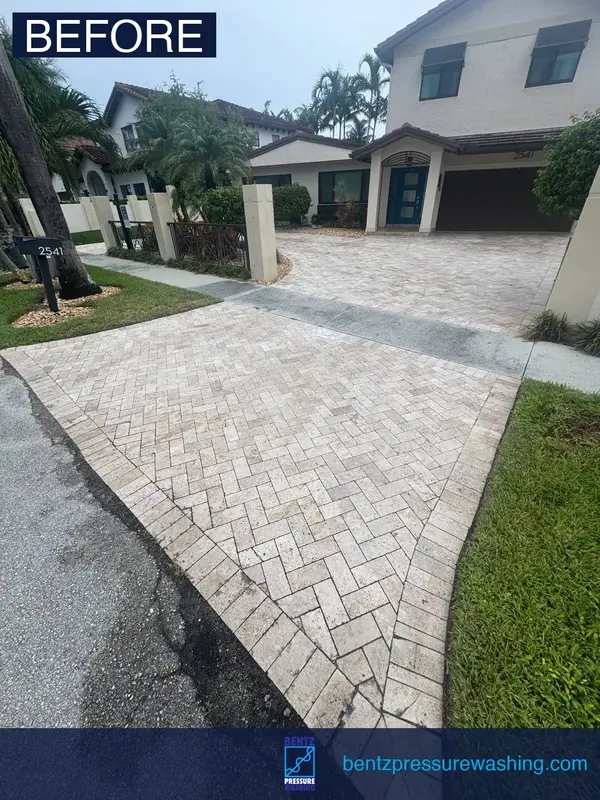Driveway cleaning before Fort Lauderdale pressure washing — dirty concrete with heavy staining
